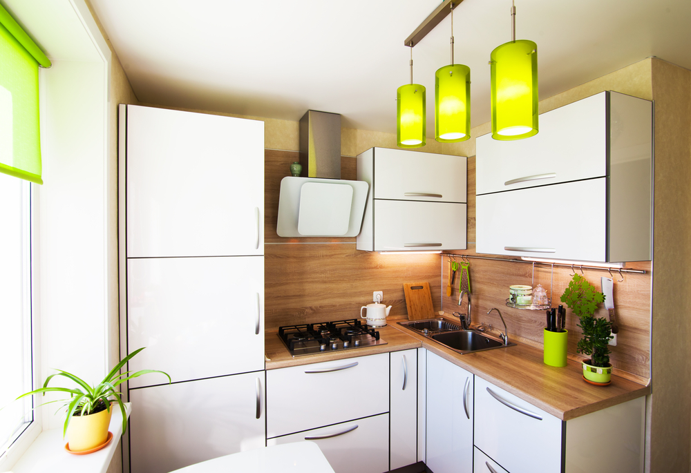White and brown interior with green accessories foe small kitchen