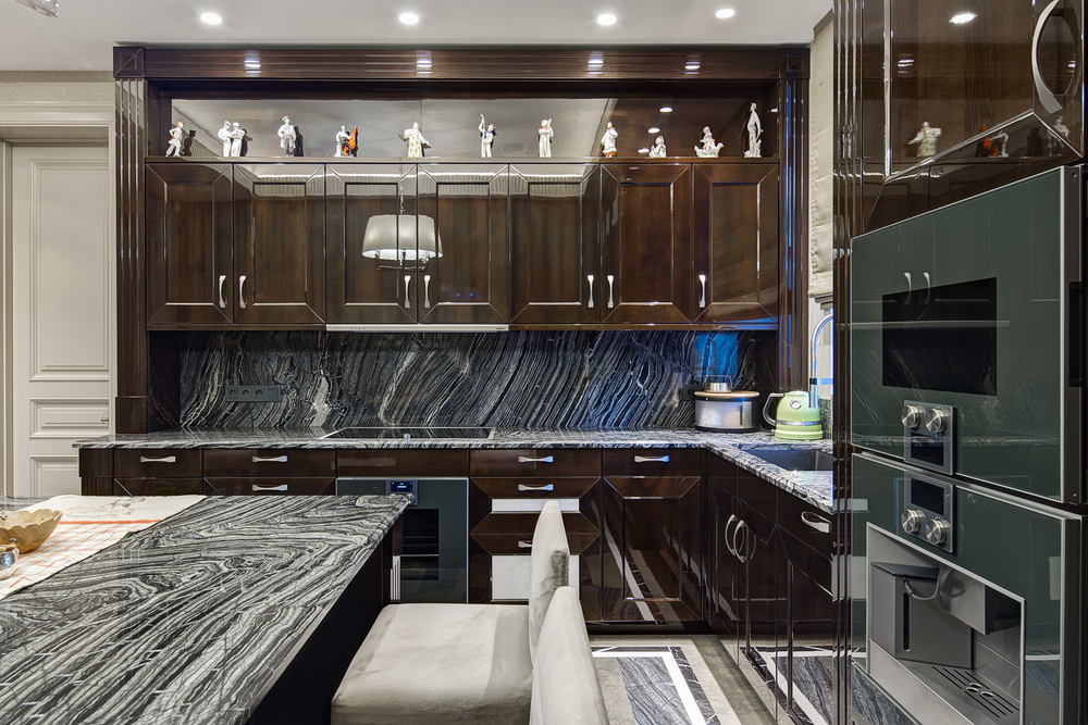 luxury kitchen interior with a large central island of marble