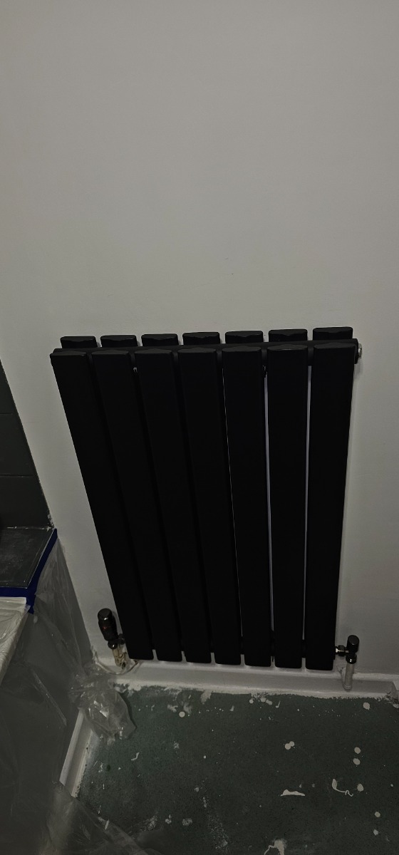Heating Engineer: Image 1 – Radiator installation 