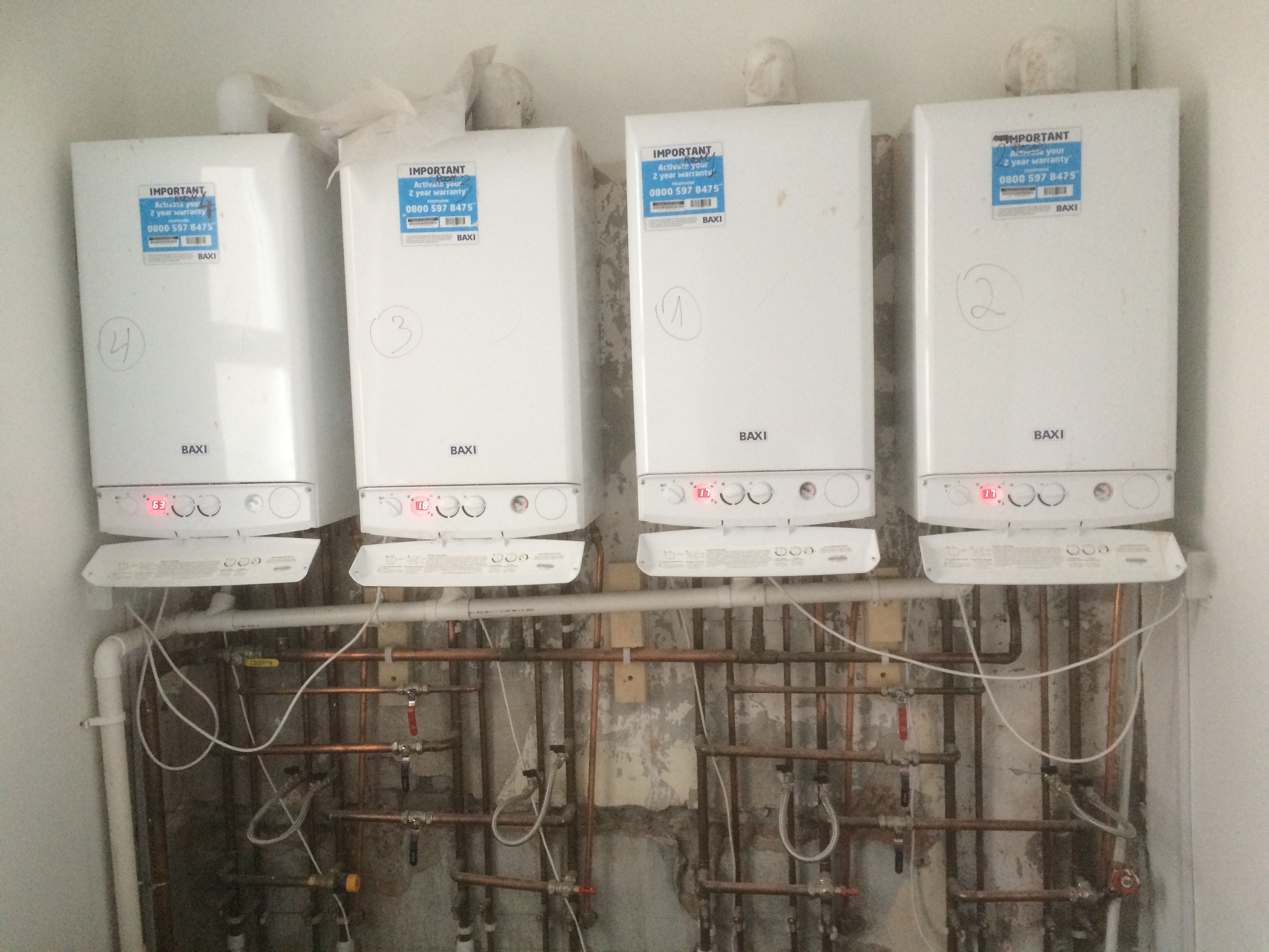 Heating Engineer: Image 1 – 4 baxi boiler system for 4 suit hotel that can provide heating and hot water even of two of boilers need service or break down