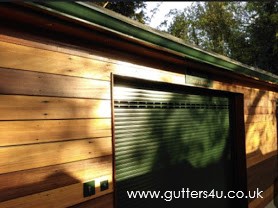 Profile: Image 3 – 5 inch seamless gutter installation, bottle green RAL 6009, in Chigwell, Essex
